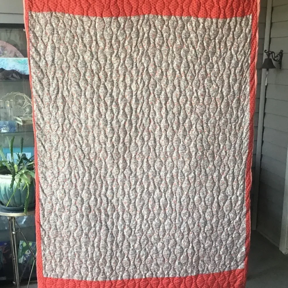NWT. Hand Crafted Quilt in Corals
